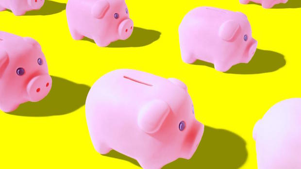 Pink piggy banks on yellow background (Digital Composite)