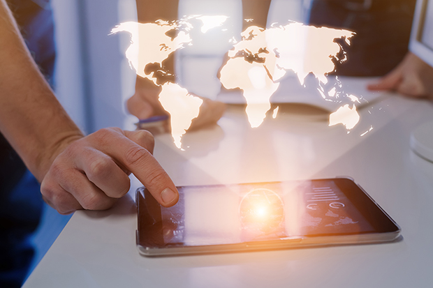 Global business concept, world map hologram, business team